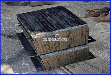 CAO SU GIẢM CHẤN DẠNG ÉP/DÁN LỚP